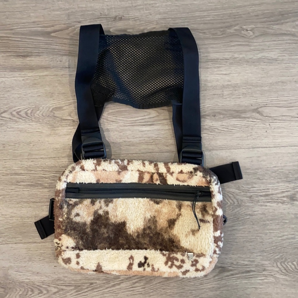 Camo backpack worn 2 ways